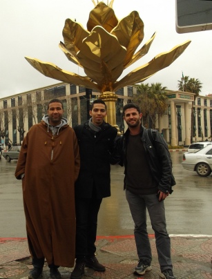 Standing with Rebe and Gilmour in front of the new golden idol of Setif.