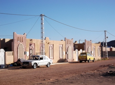 The view across the street from our house in Taghit. Take note of the old Peugeots, popular wherever we went.