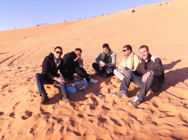 Eating a very late lunch on the side of a dune in Taghit, last day of 2013.