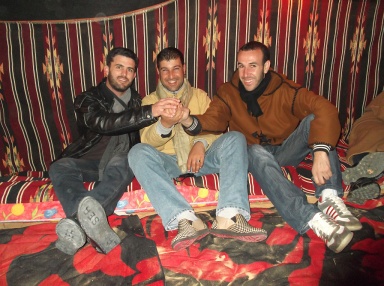Sofian, Ahmed and myself in the party tent. Taghit.