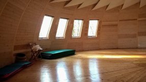 One of the beautiful wooden meditation buildings at the Centro